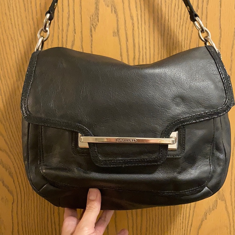 Coach black leather shoulder bag.
